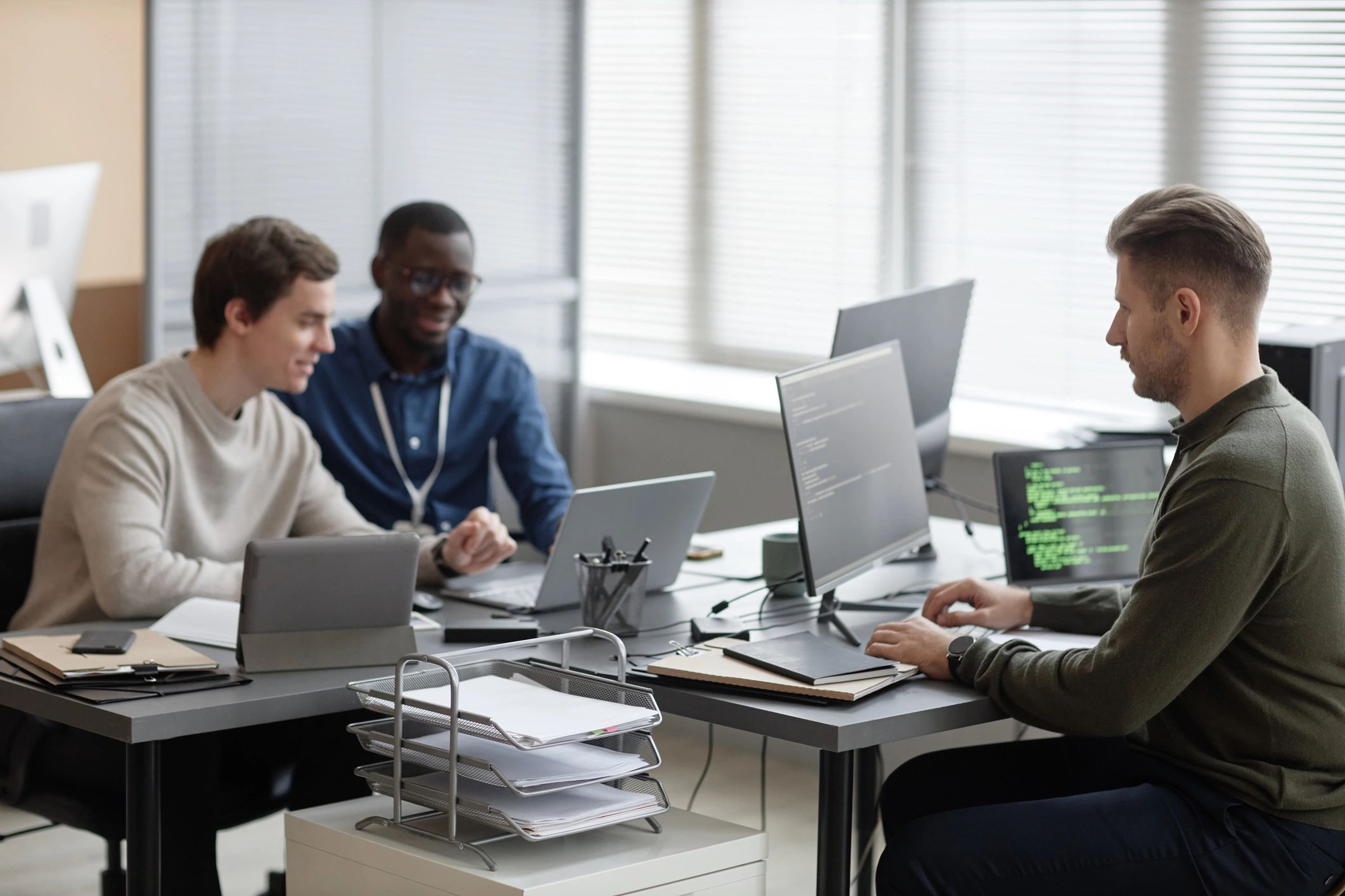 IT team working in a modern business technology office